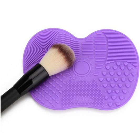 Makeup brush cleaning pad